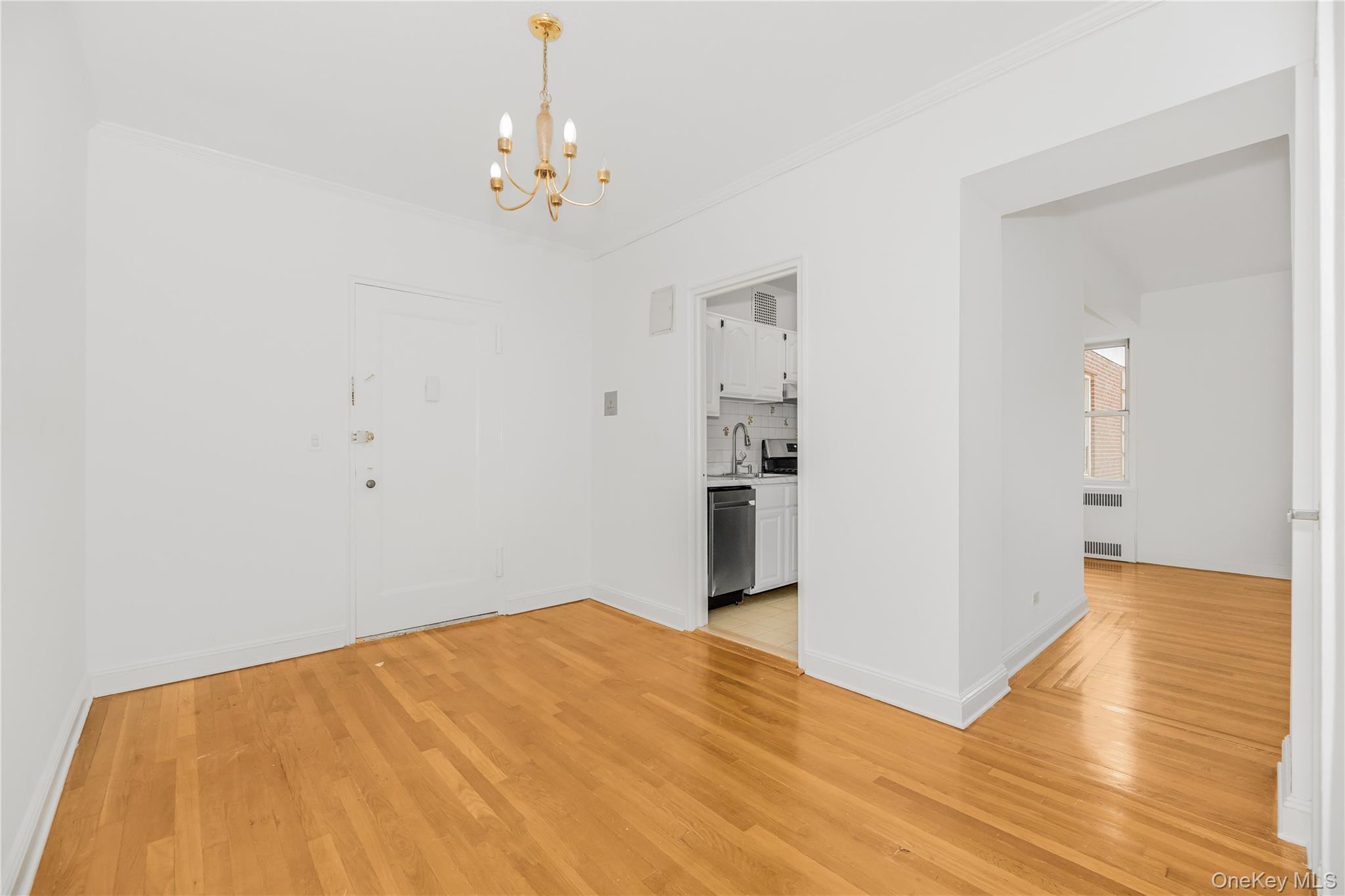 766 Palmer Road, Unit 2D Bronxville, NY 10708 - Photo 3 of 21 a bedroom with a bed and wooden floor