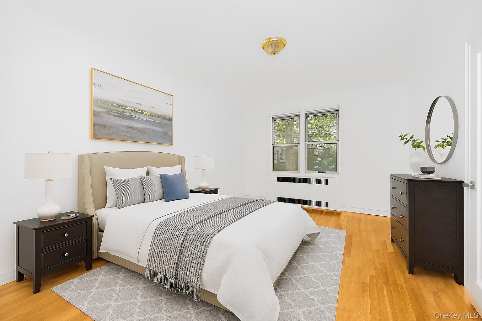 766 Palmer Road, Unit 2D Bronxville, NY 10708 - Photo 7 of 21 a bedroom with bed and window