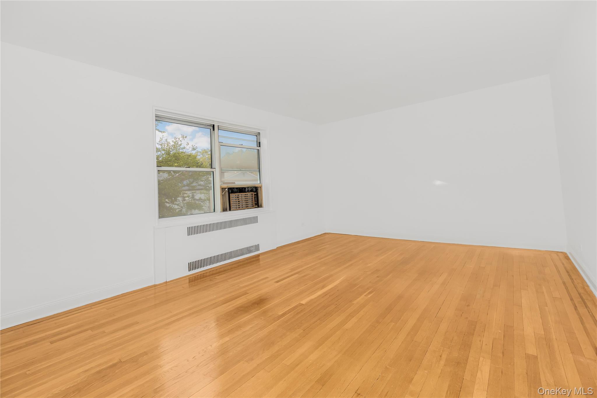 766 Palmer Road, Unit 2D Bronxville, NY 10708 - Photo 9 of 21 a view of an empty room with a window
