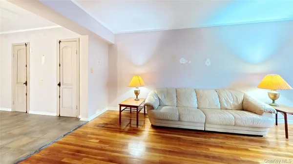 a living room with furniture and a table