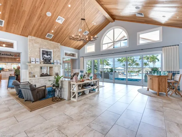 a view of a backyard with sitting area