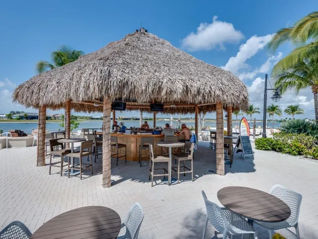 an aerial view of a houses with outdoor space