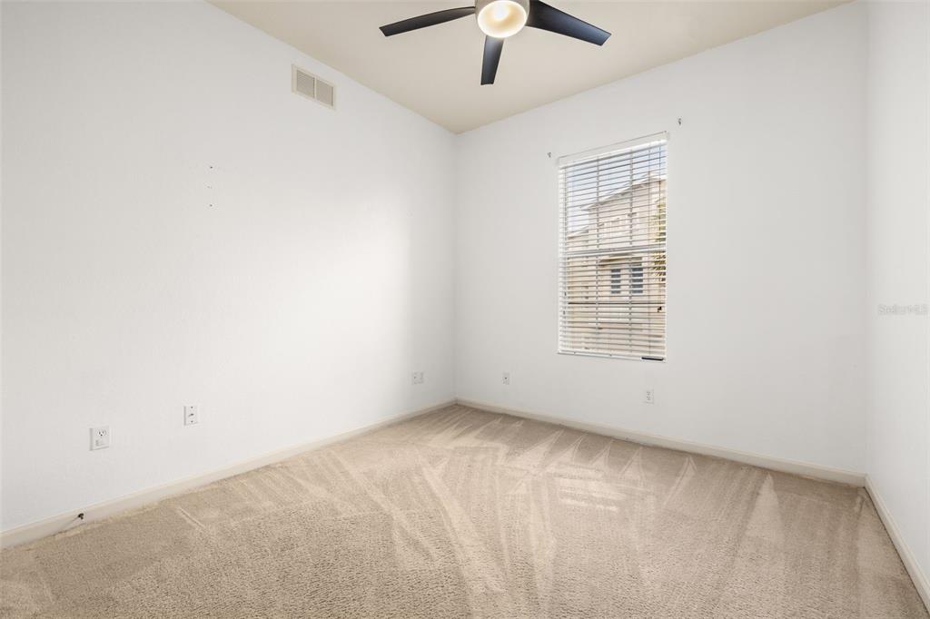 3025 Greystone Loop, Unit 204 Kissimmee, FL 34741 - Photo 14 of 37 an empty room with a window