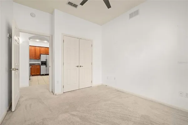an empty room with a bathroom