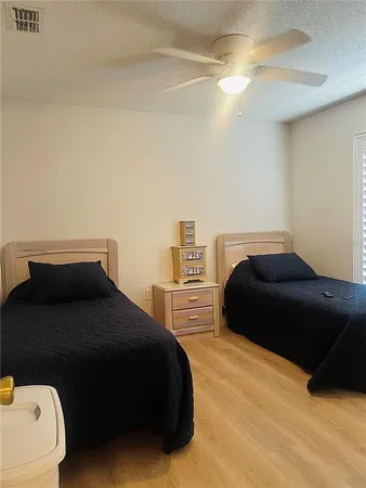a bedroom with a bed and a closet