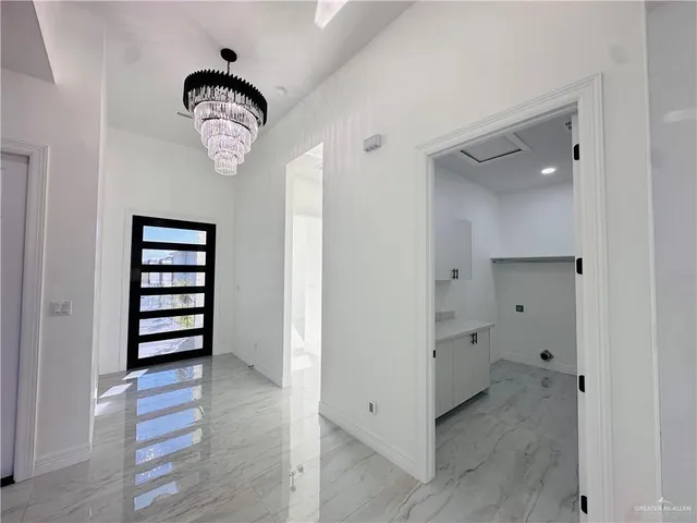 an empty space with wooden floor