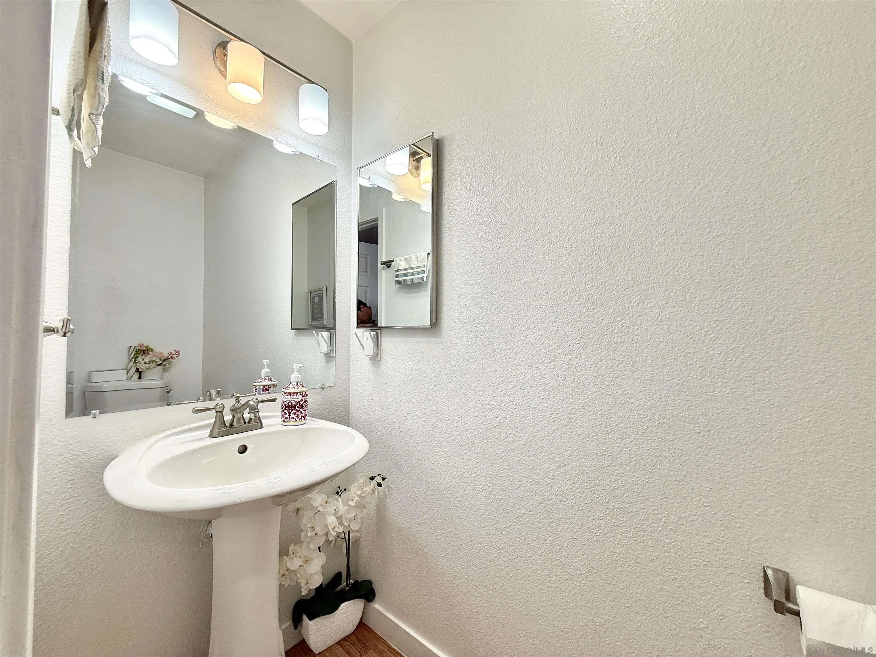 1280 West Main Street, Unit 3 El Cajon, CA 92020 - Photo 13 of 29 a bathroom with a sink and a mirror