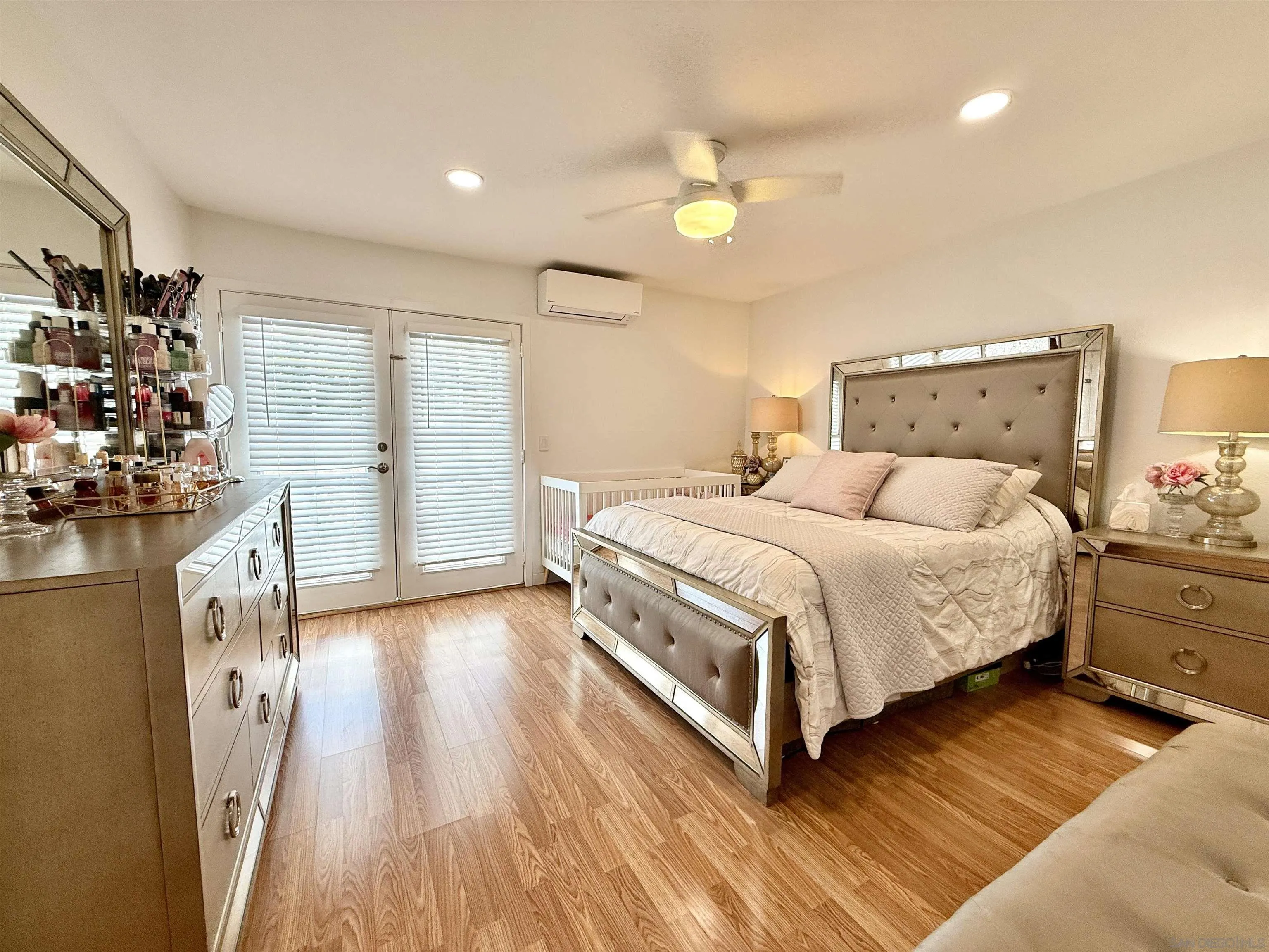 1280 West Main Street, Unit 3 El Cajon, CA 92020 - Photo 15 of 29 a bedroom with a bed dresser and a window