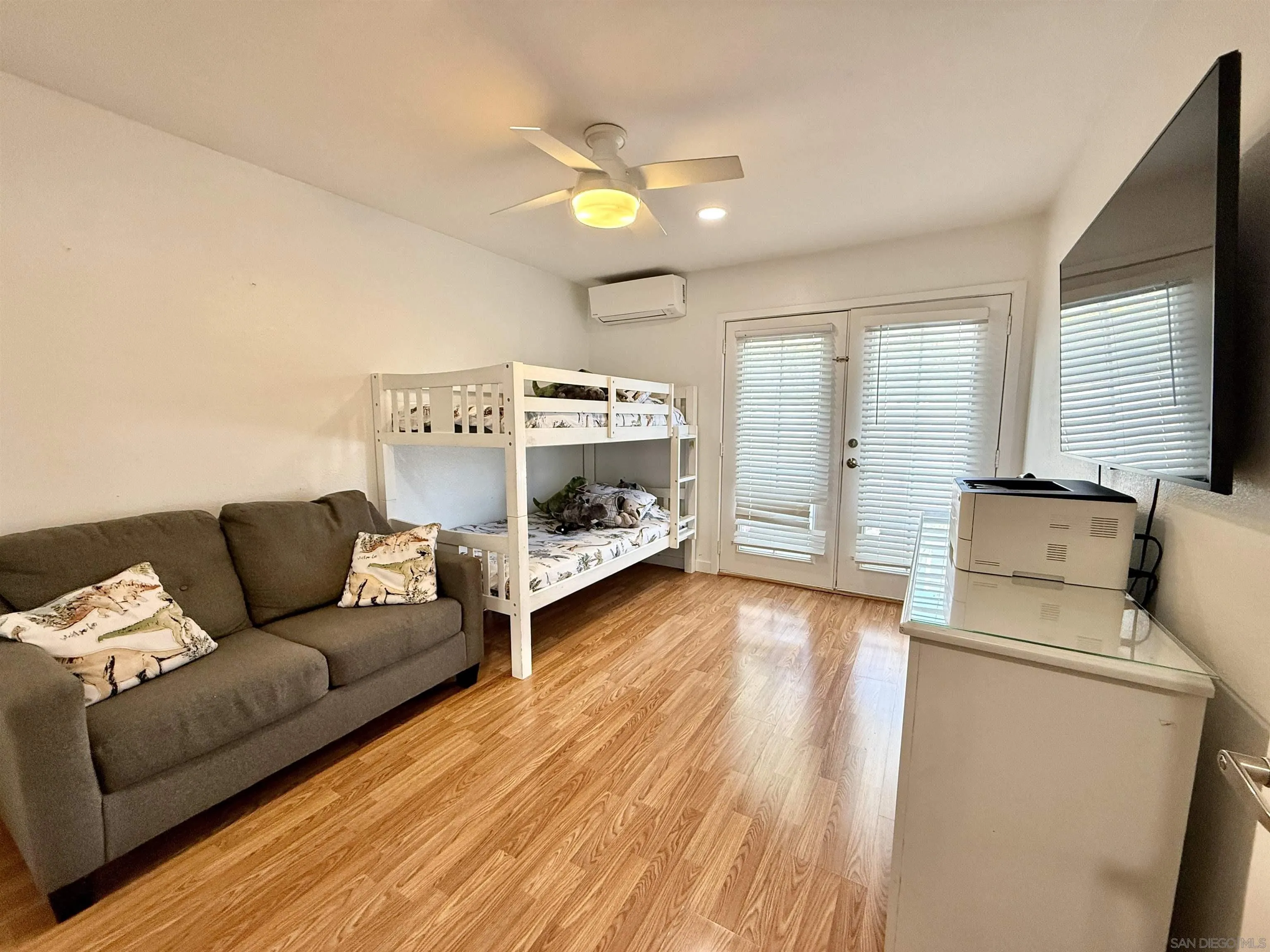 1280 West Main Street, Unit 3 El Cajon, CA 92020 - Photo 18 of 29 a living room with furniture and a wooden floor