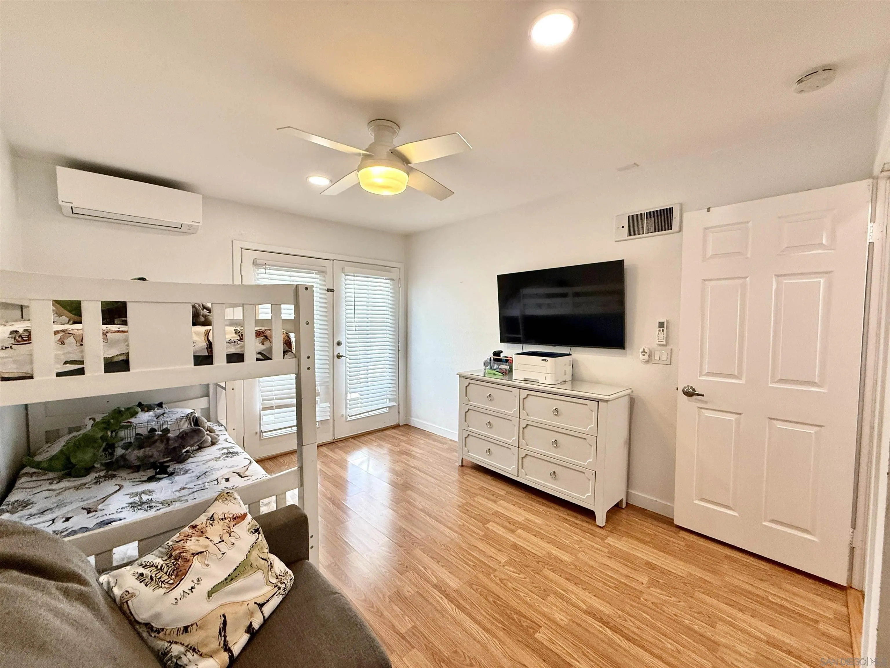 1280 West Main Street, Unit 3 El Cajon, CA 92020 - Photo 19 of 29 a living room with furniture and a flat screen tv