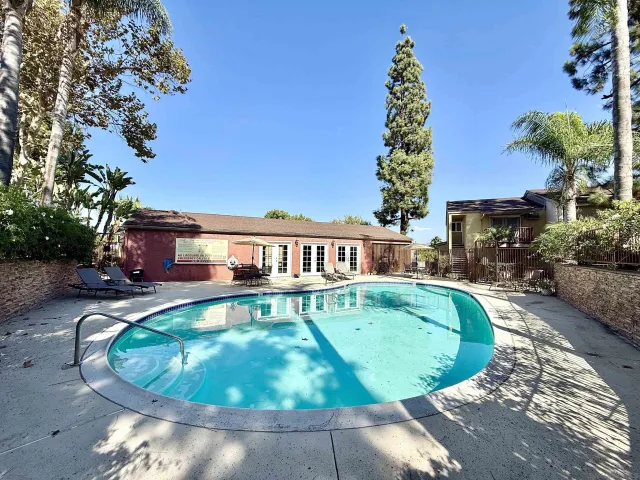 a view of a house with a swimming pool