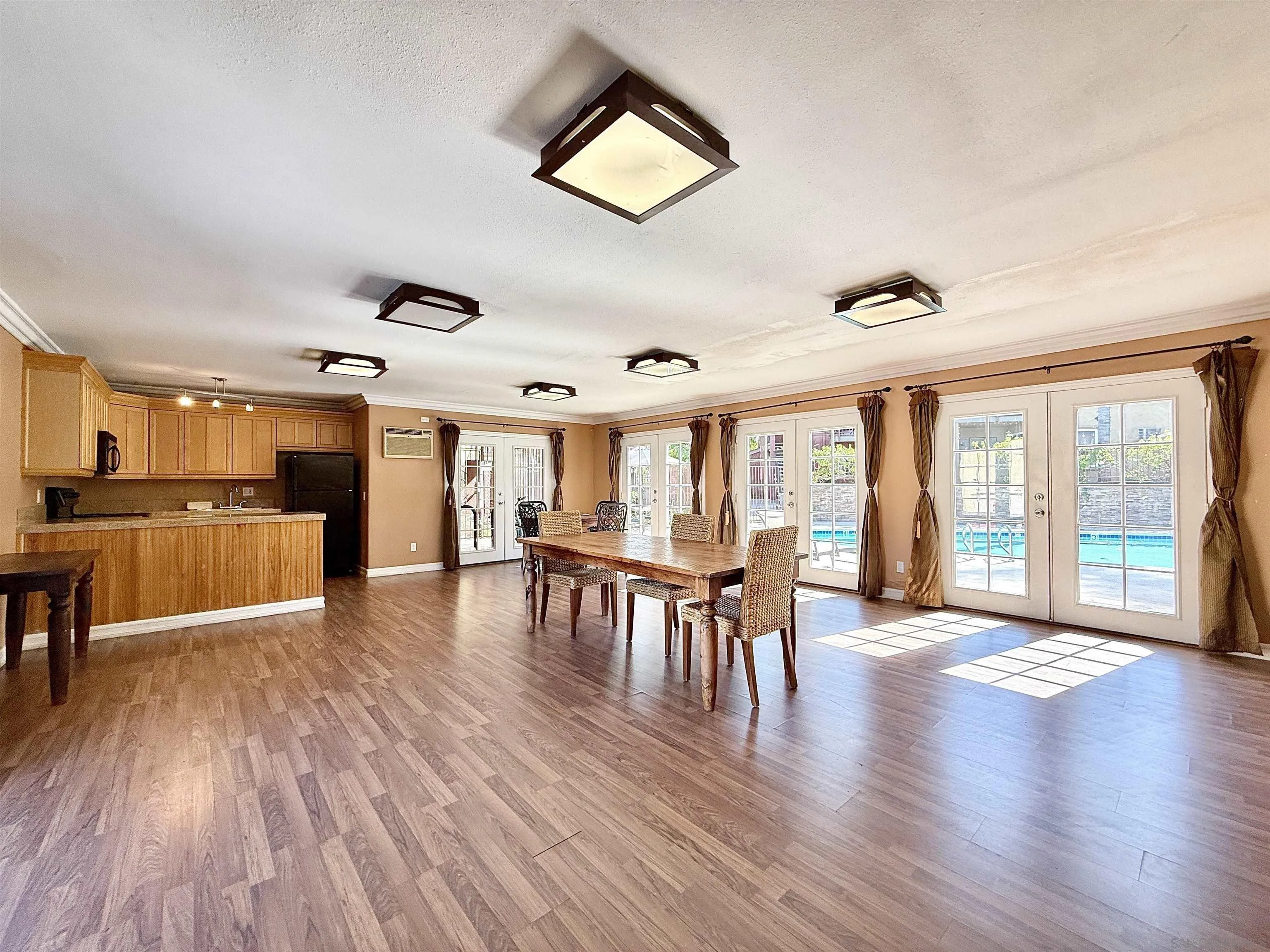 1280 West Main Street, Unit 3 El Cajon, CA 92020 - Photo 24 of 29 a view of a livingroom with furniture wooden floor and windows