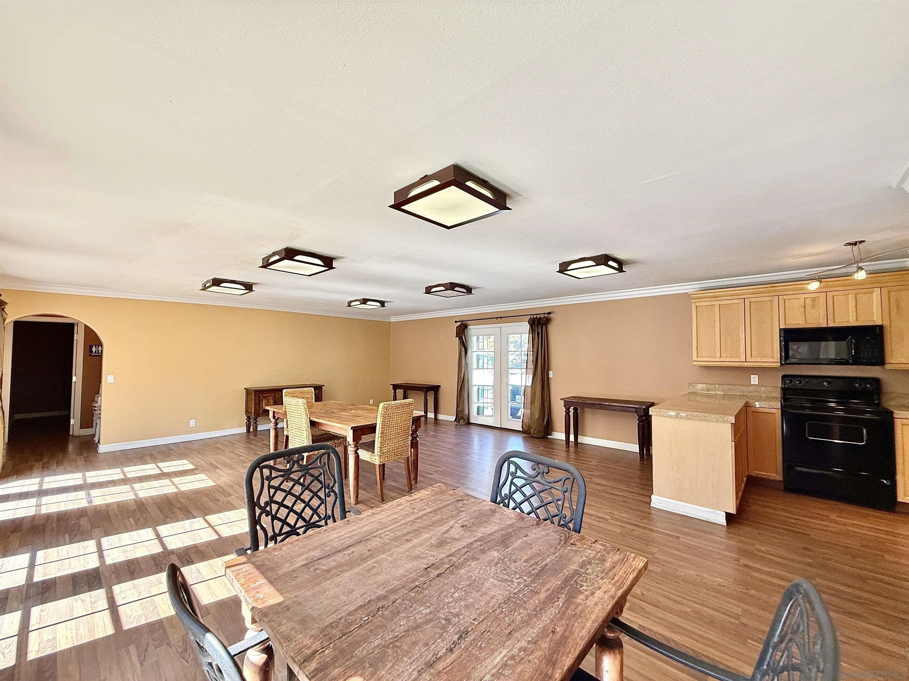 1280 West Main Street, Unit 3 El Cajon, CA 92020 - Photo 26 of 29 a bedroom with a bed and furniture