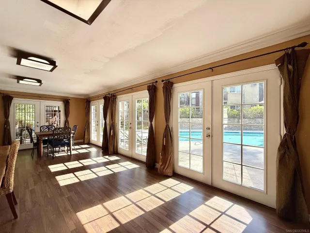 a front view of a house with yard and garage