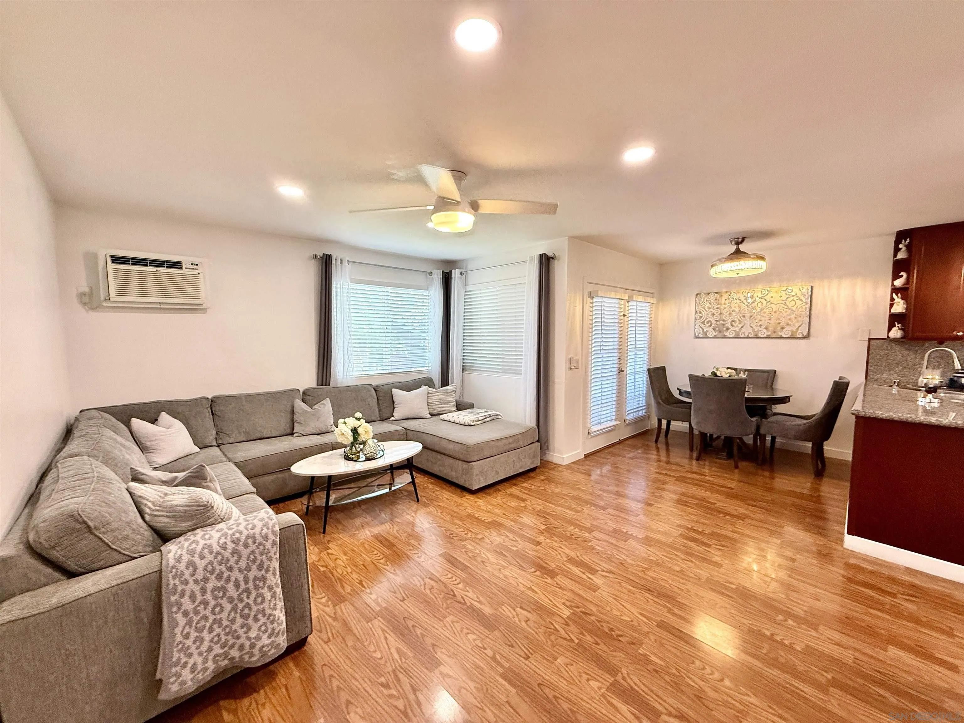 1280 West Main Street, Unit 3 El Cajon, CA 92020 - Photo 10 of 29 a living room with furniture and a wooden floor