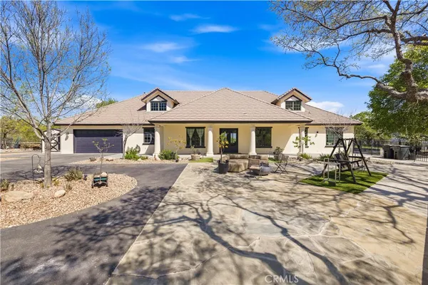 a view of a house with a patio