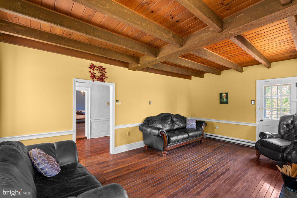 201 East Moyer Road Pottstown, PA 19464 - Photo 13 of 64 a living room with furniture and a wooden floor