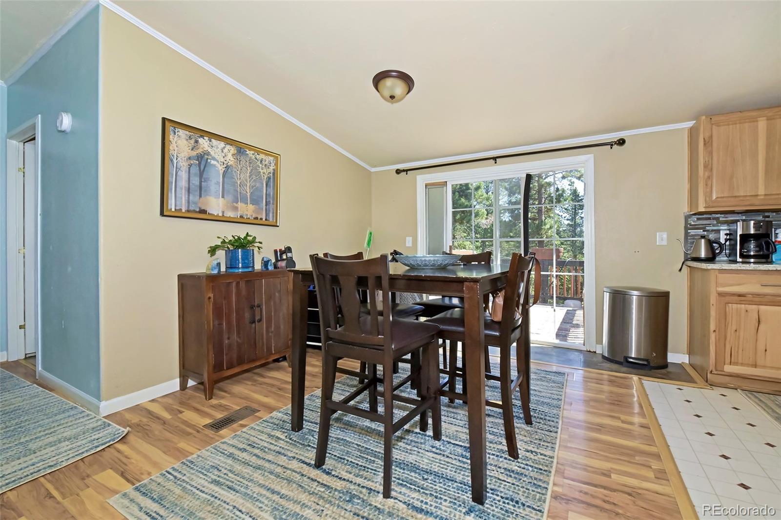 44 Southpark Road Florissant, CO 80816 - Photo 19 of 39 a view of a dining room with furniture window and wooden floor