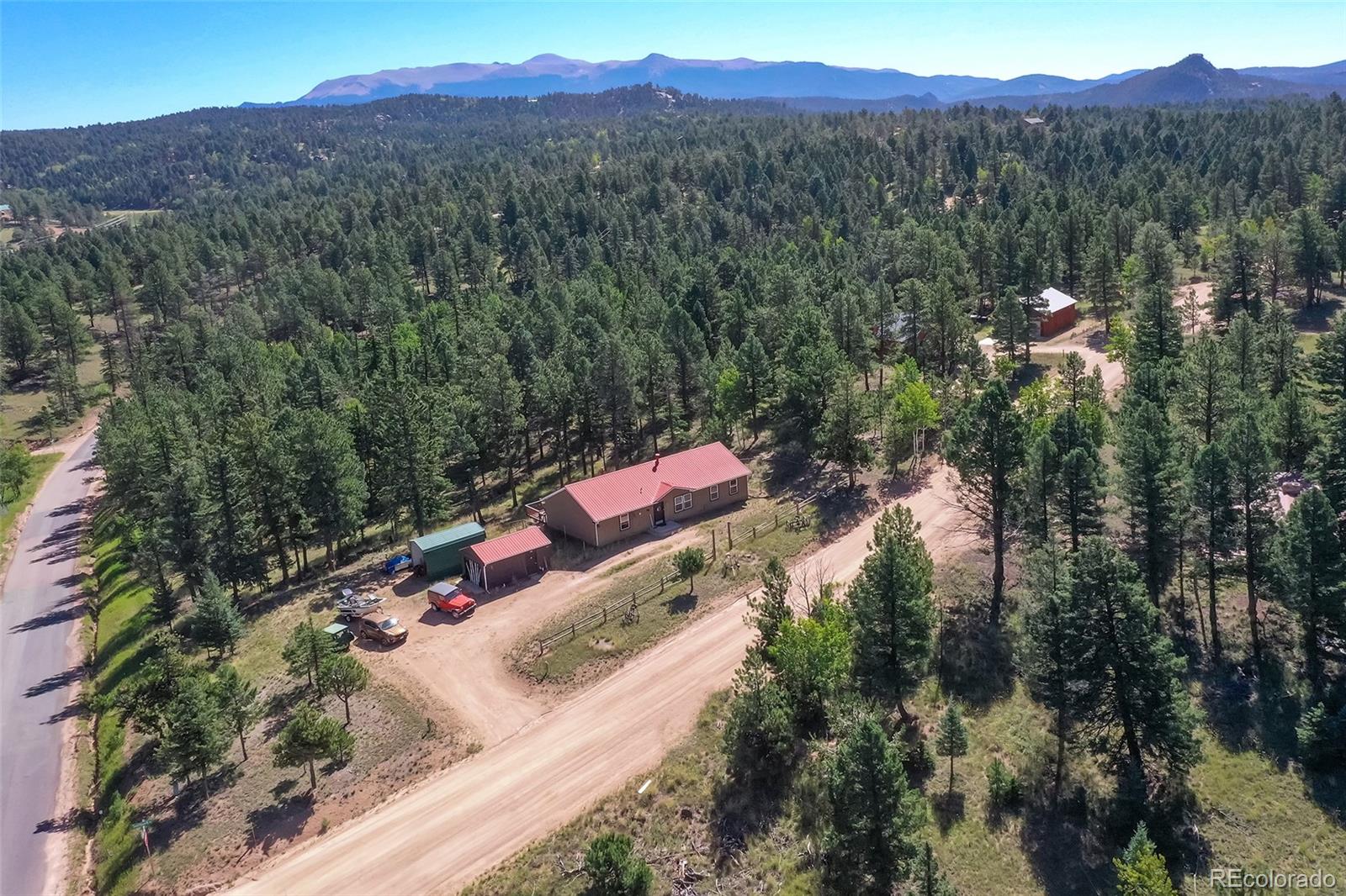 44 Southpark Road Florissant, CO 80816 - Photo 34 of 39 an aerial view of a house with a yard
