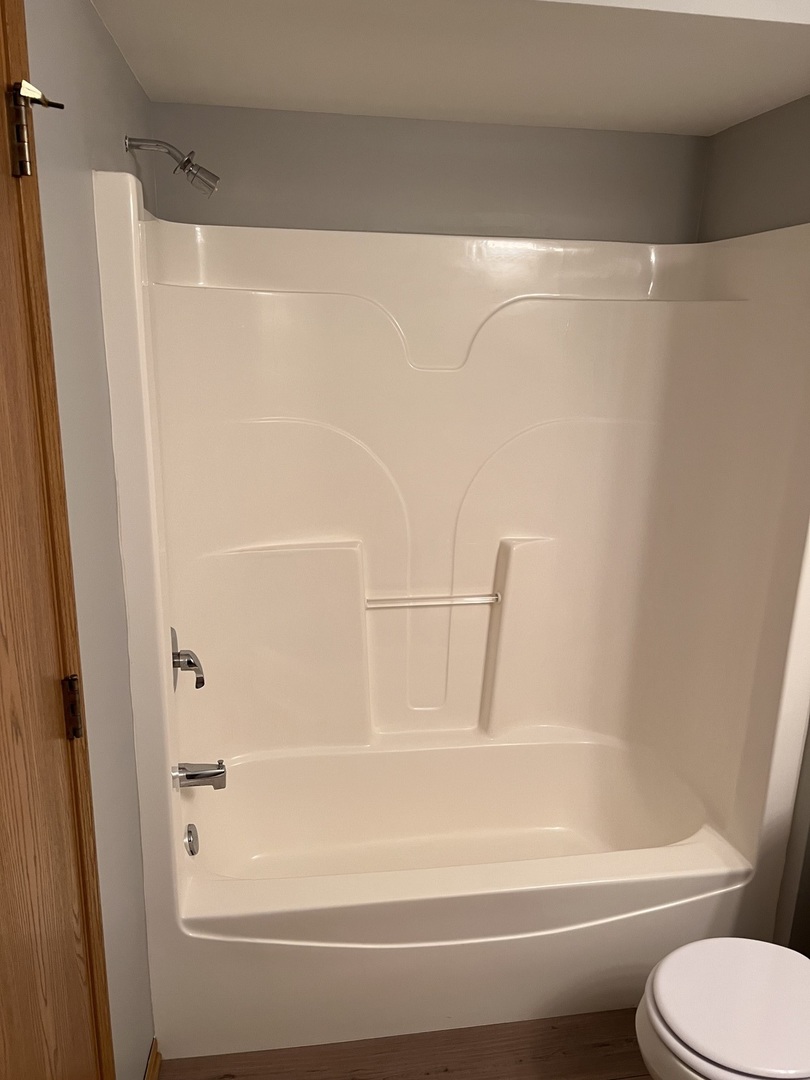 25838 Geranium Lane Monee, IL 60449 - Photo 14 of 21 a bathroom with a shower and a toilet