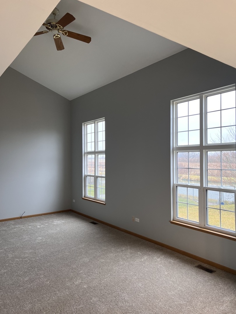 25838 Geranium Lane Monee, IL 60449 - Photo 2 of 21 an empty room with windows