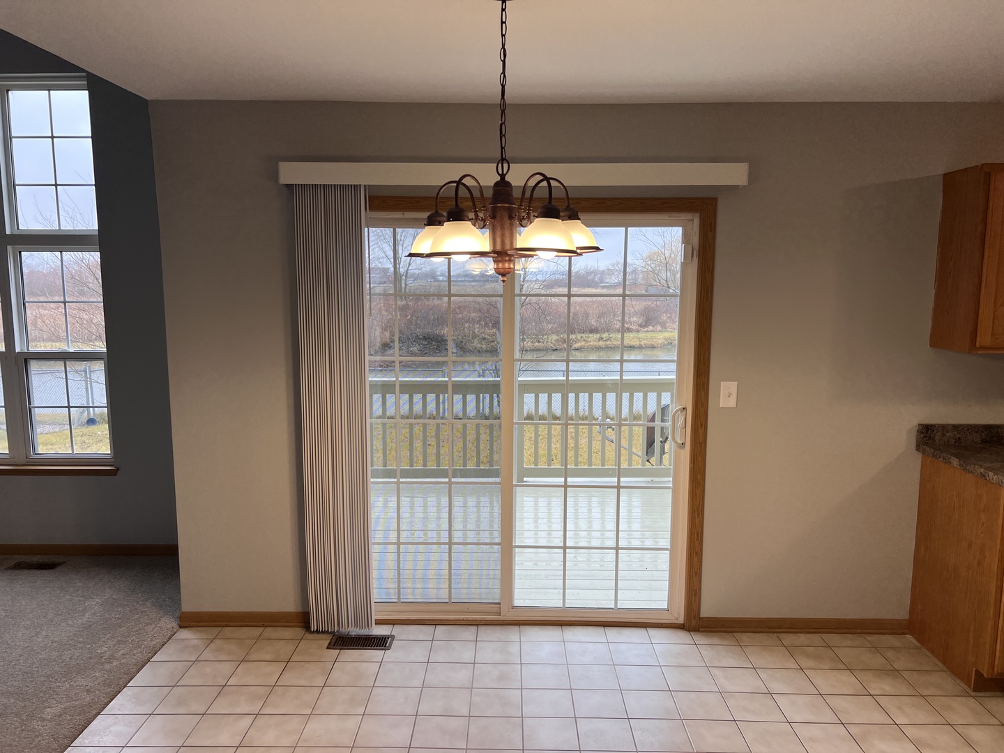 25838 Geranium Lane Monee, IL 60449 - Photo 4 of 21 a view of an empty room with a window