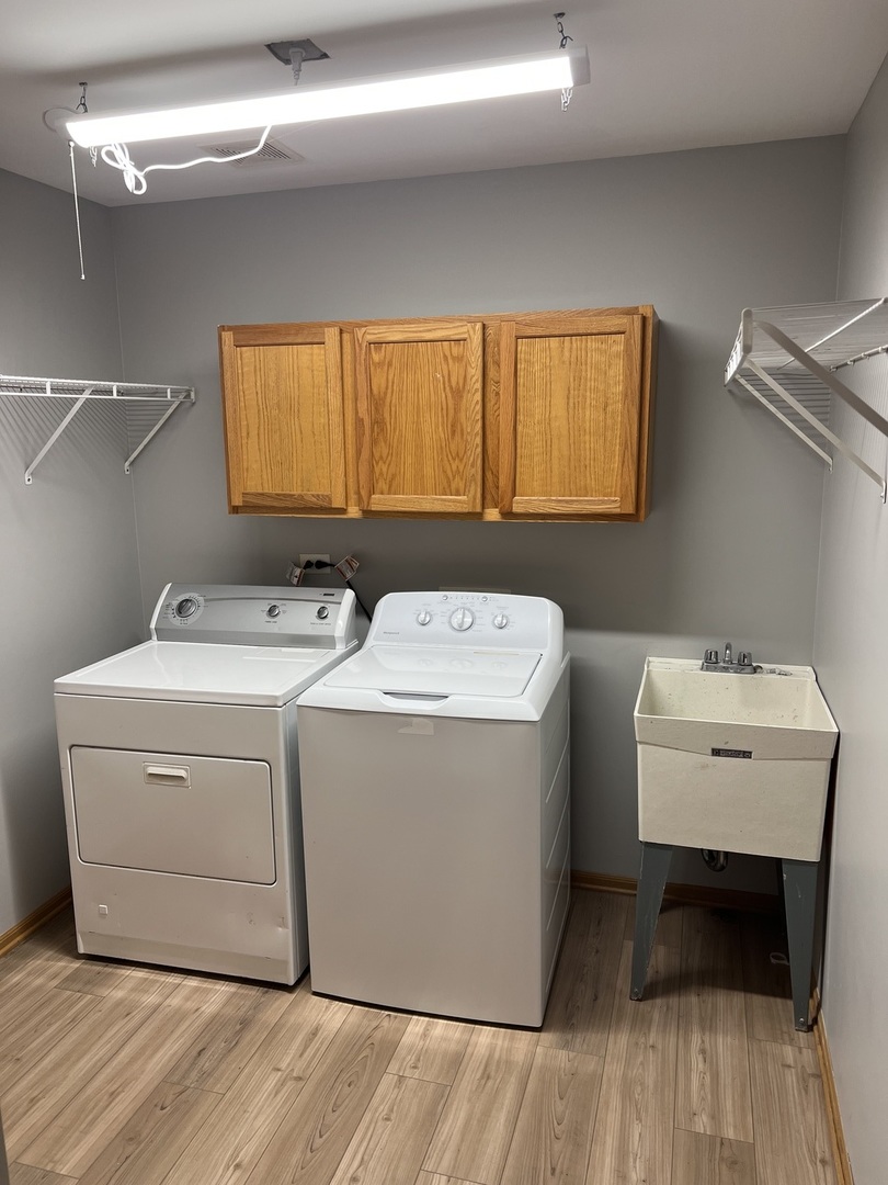 25838 Geranium Lane Monee, IL 60449 - Photo 6 of 21 a utility room with dryer and washer