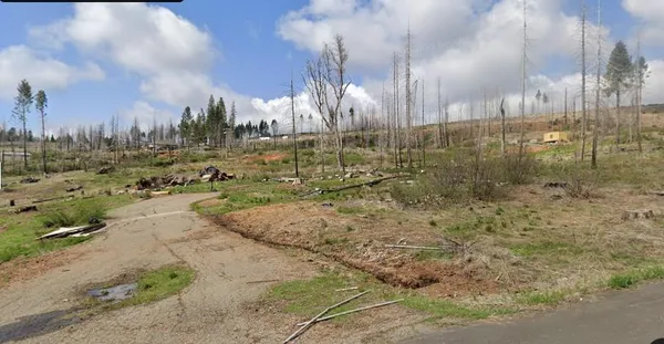 a view of a city street from a building