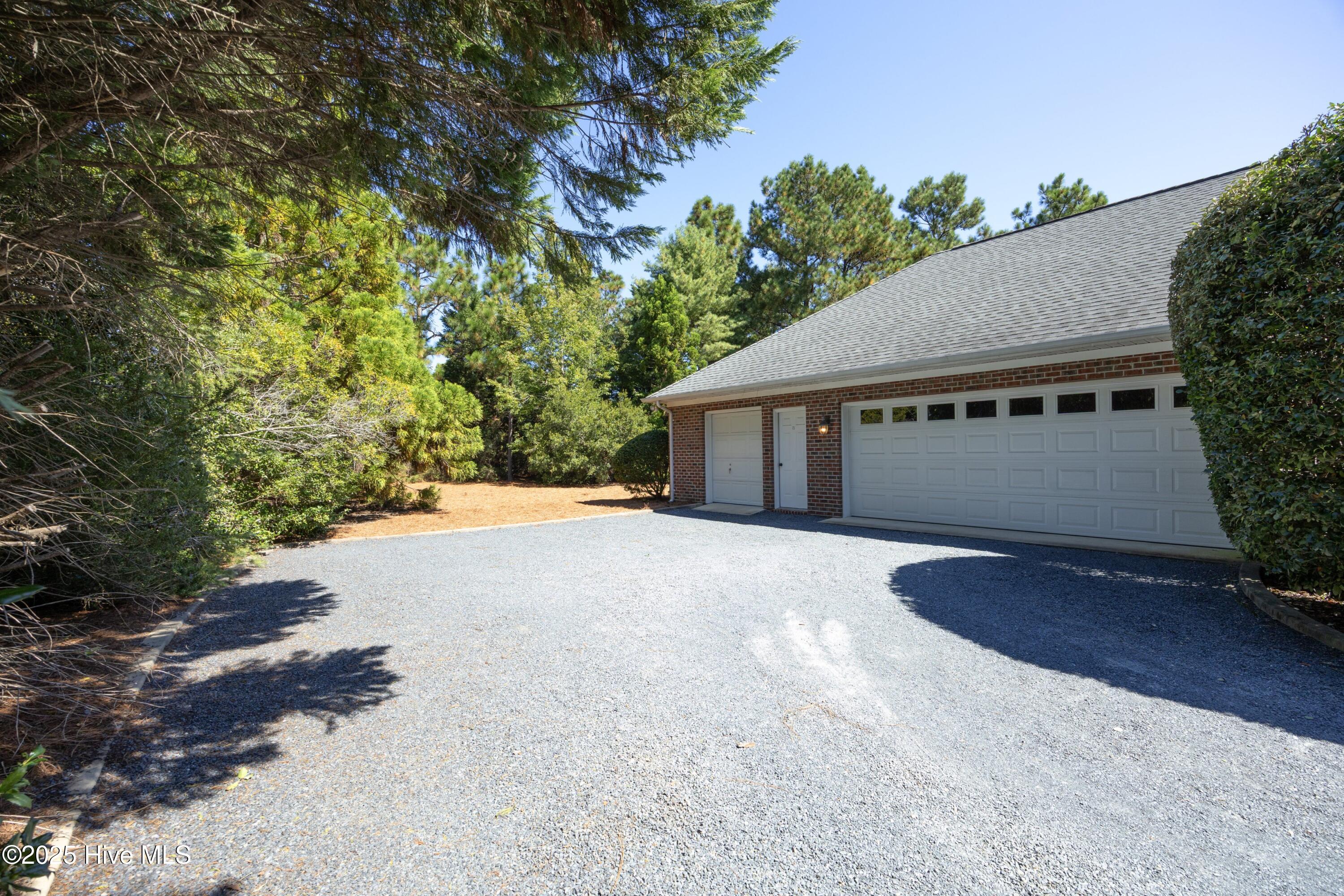 55 McQueen Road Pinehurst, NC 28374 - Photo 43 of 45 39GarageExterior