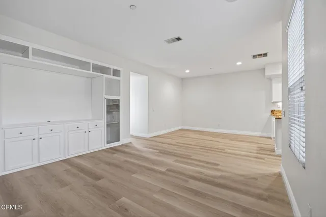 a view of kitchen with wooden floor