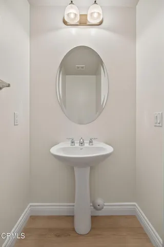 a front view of a house with a yard and a garage