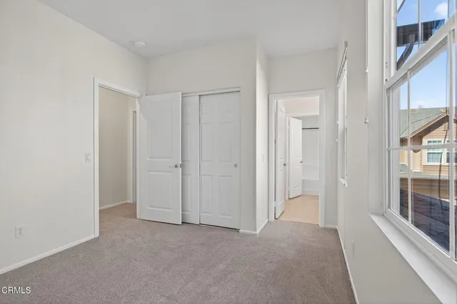 a view of front door and small windows