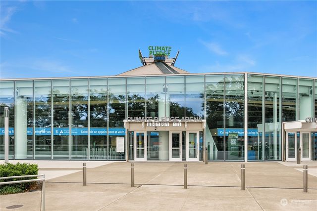 a view of a swimming pool with a yard