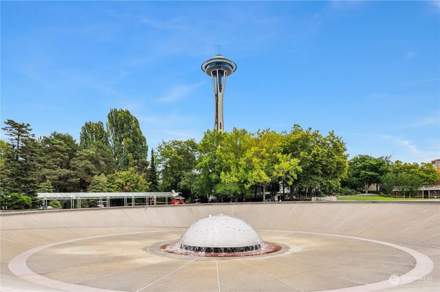 a view of a swimming pool with an ocean view
