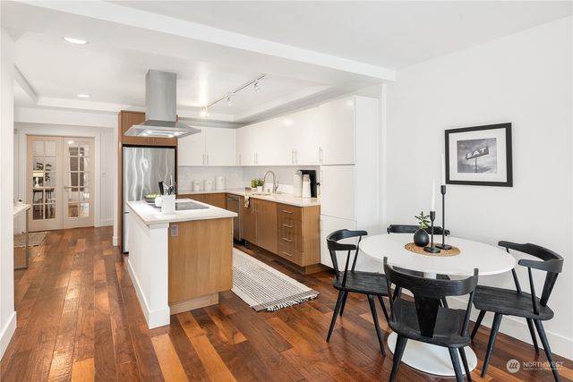 a bedroom with a bed and a table