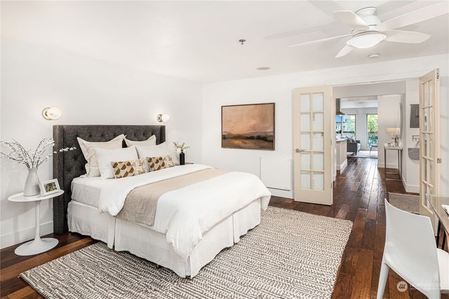 a kitchen with a refrigerator and a sink