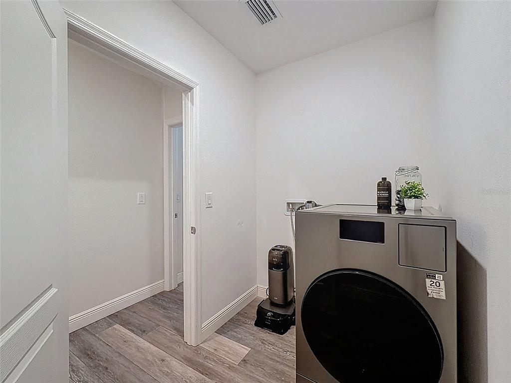 237 Leafy Way Avenue Spring Hill, FL 34606 - Photo 38 of 68 a view of a storage & utility room with washer and dryer