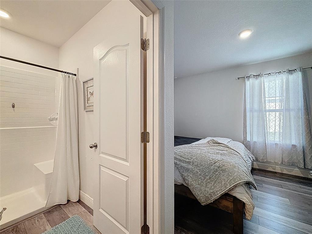 237 Leafy Way Avenue Spring Hill, FL 34606 - Photo 39 of 68 a bedroom with a bed and a window