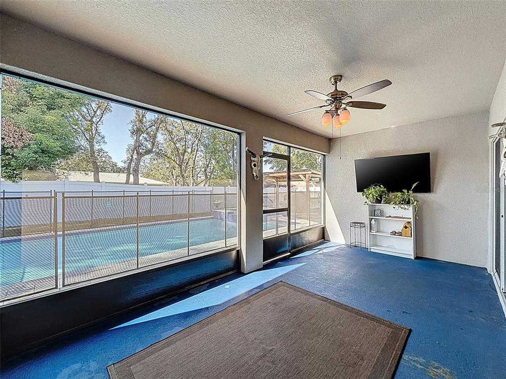 237 Leafy Way Avenue Spring Hill, FL 34606 - Photo 46 of 68 a view of a livingroom with furniture window and wooden floor