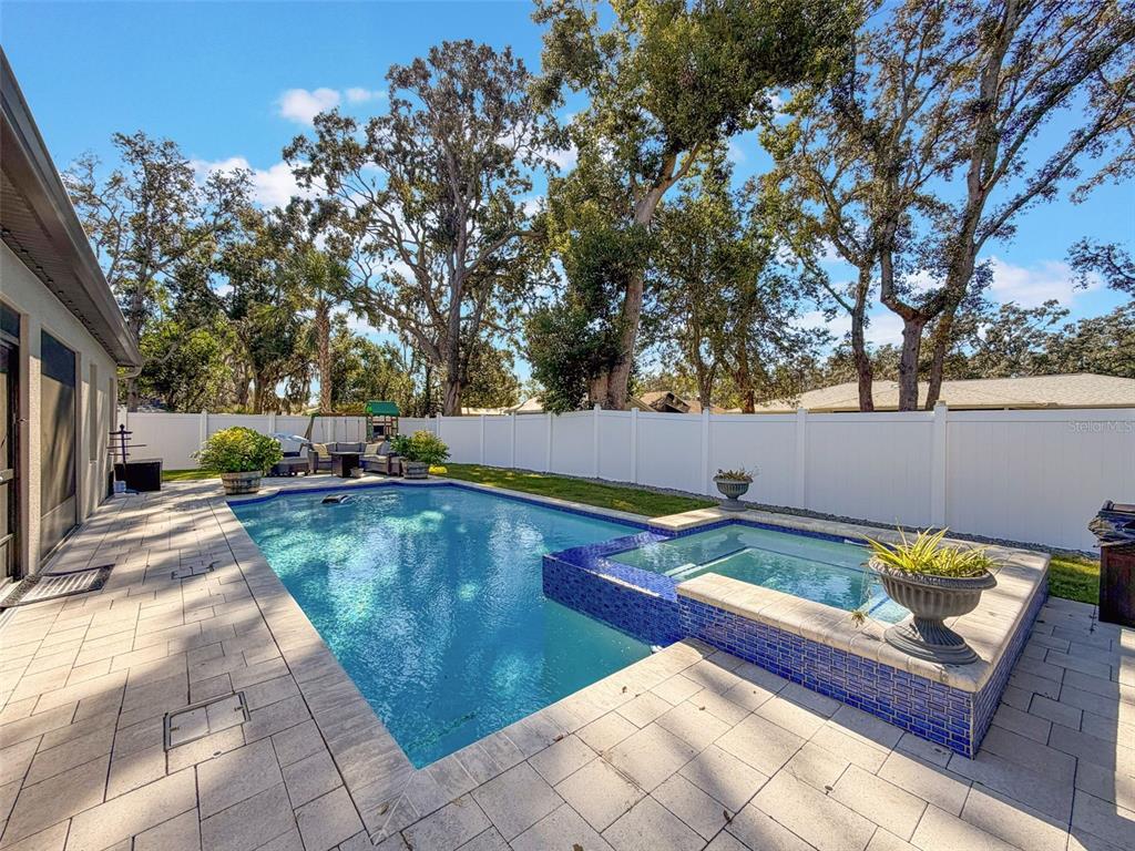 237 Leafy Way Avenue Spring Hill, FL 34606 - Photo 49 of 68 a view of swimming pool with chairs