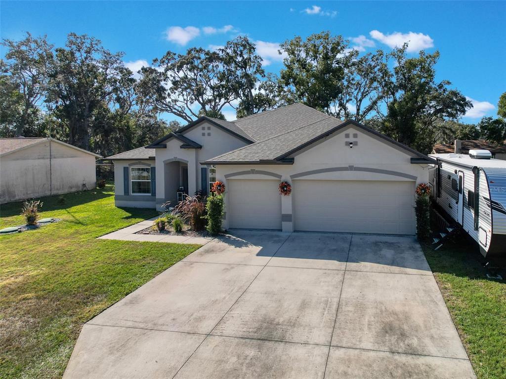237 Leafy Way Avenue Spring Hill, FL 34606 - Photo 64 of 68 a view of house with outdoor space