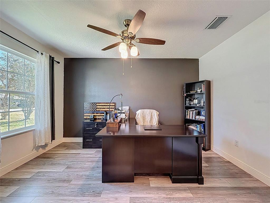 237 Leafy Way Avenue Spring Hill, FL 34606 - Photo 10 of 68 a living room with furniture