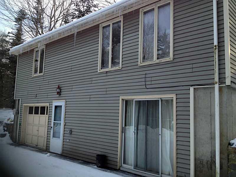 12 Oak Ridge Road Mount Desert, ME 04660 - Photo 3 of 11 Exterior Front. Garage under home....