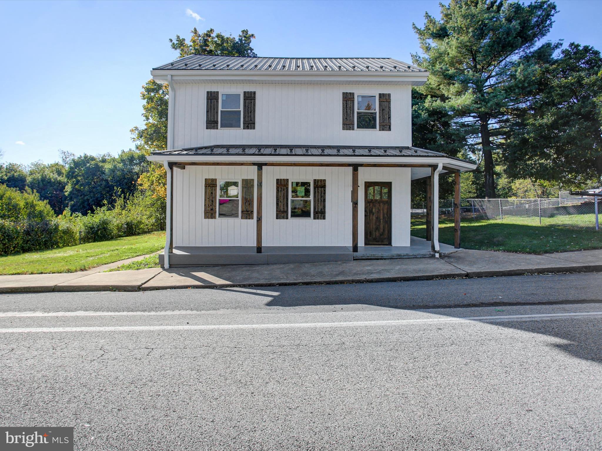 16 East Main Street Newburg, PA 17240 - Photo 2 of 48 a view of a house with a yard and large tree