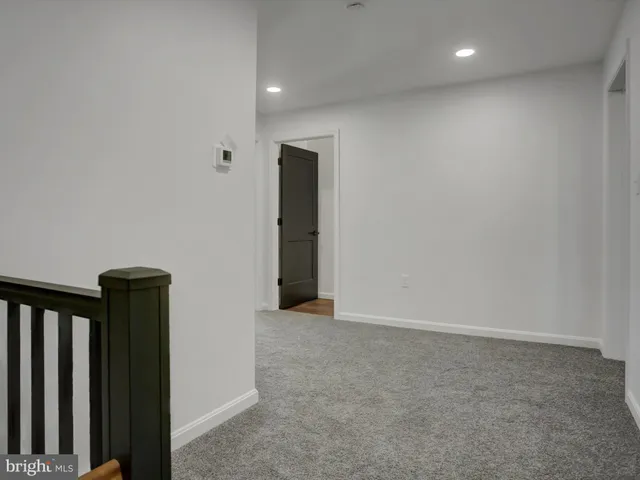 a view of hallway with stairs