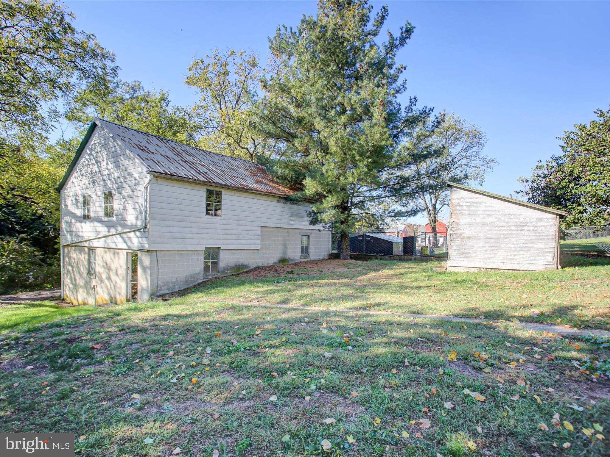 16 East Main Street Newburg, PA 17240 - Photo 46 of 48 a backyard of a house with table and chairs