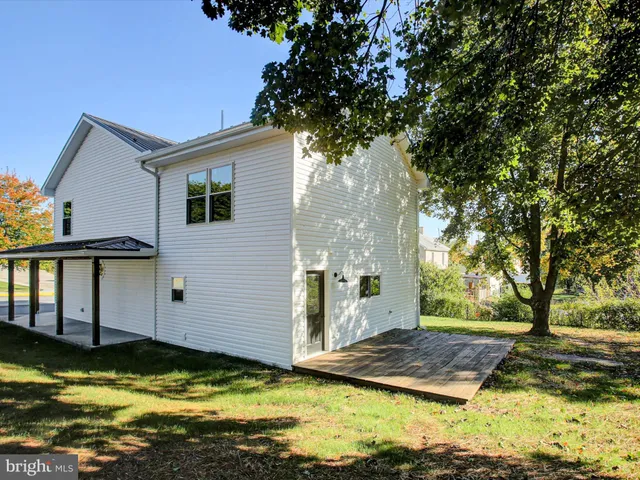 a view of a house with swimming pool