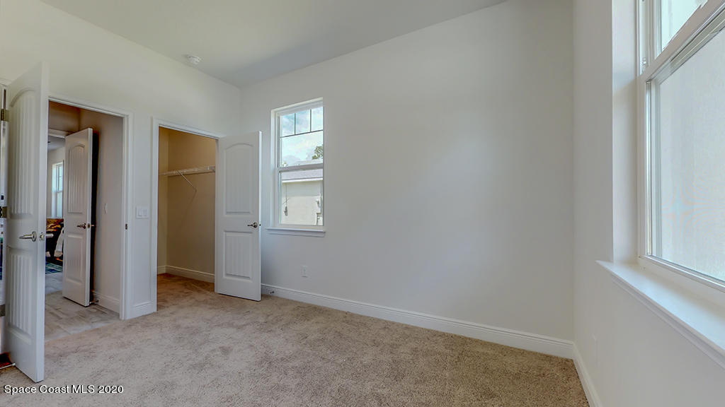 572 Corbin Circle Southwest Palm Bay, FL 32908 - Photo 24 of 32 an empty room that has a window in it