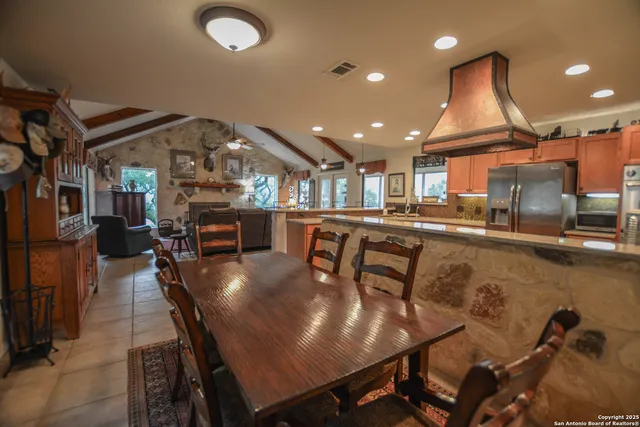 a bathroom with a toilet a sink and a mirror