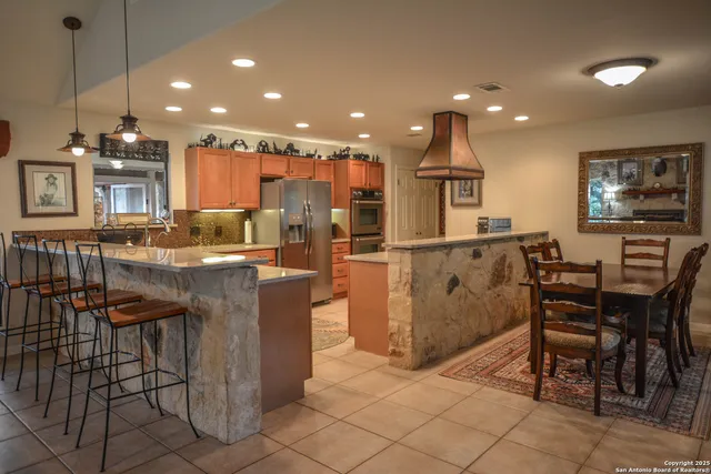 a bedroom with a bed and a table in it